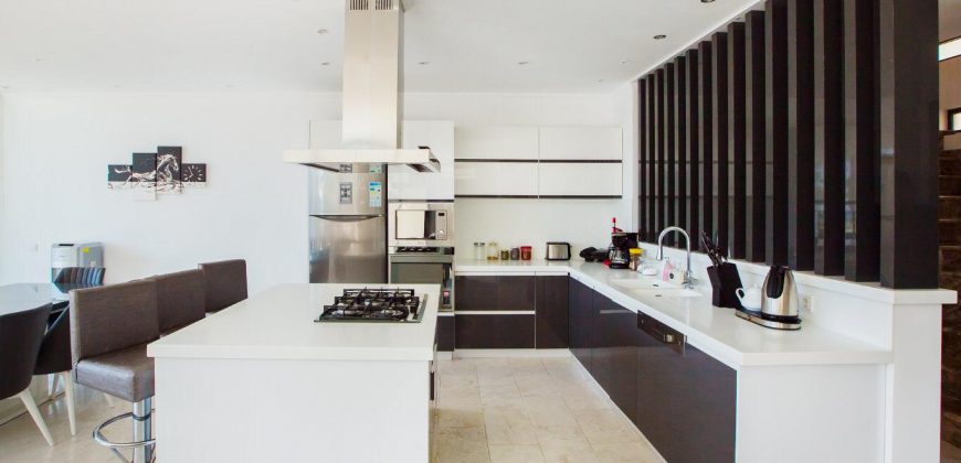 Incredibly stylish villa with private infinity pool and stunning views over Kalamar Bay For Sale