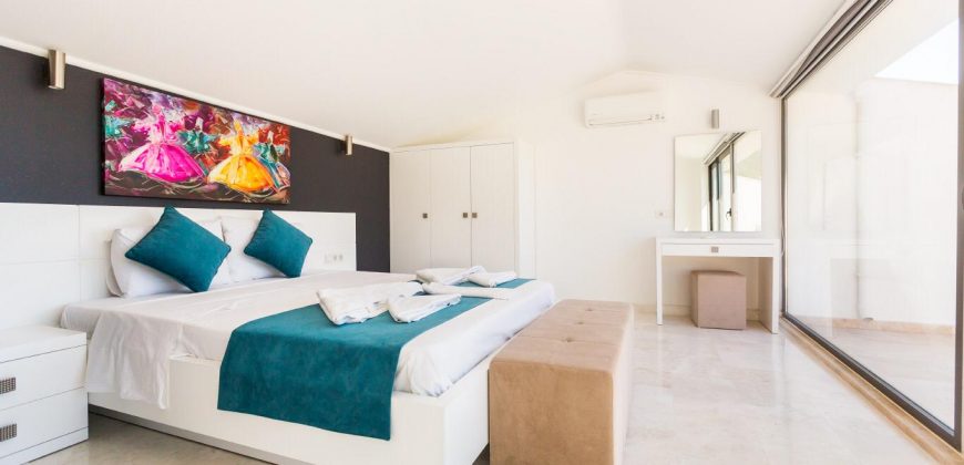 Incredibly stylish villa with private infinity pool and stunning views over Kalamar Bay For Sale